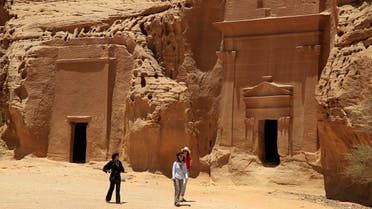 In this photograph made on Thursday, May 10, 2012, foreign tourists visit a Nabataean tombs complex in the desert archaeological site of Madain Saleh, in Al Ula city, 1043 km (648 miles) northwest of the capital Riyadh, Saudi Arabia. (AP)