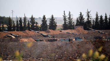 This picture shows artillery pieces on the Turkish side of the border with Syria near Akcakale in Sanliurfa province on October 8, 2019. (AFP)