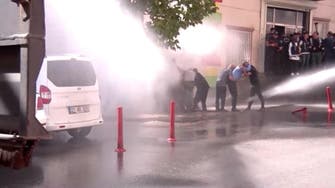 Turkish police investigate Kurdish leaders, fire water cannon at protesters