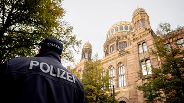 A policeman stands guard in front of the Neue Synagoge (New Synagogue) in Berlin, Germany, as increased security measures are taken following a shooting in Dresden, eastern Germany, on October 9, 2019. (AFP)