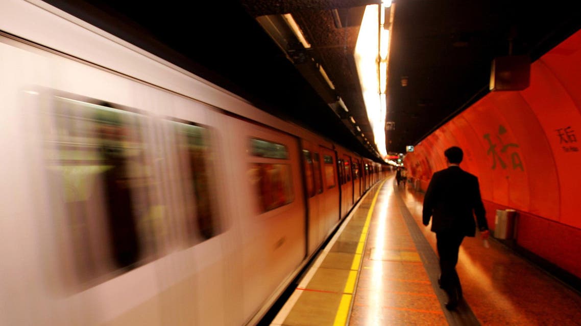 A Hong Kong MTR Metro train arrives at a downtown station Wednesday, Nov. 24, 2004. (AP)