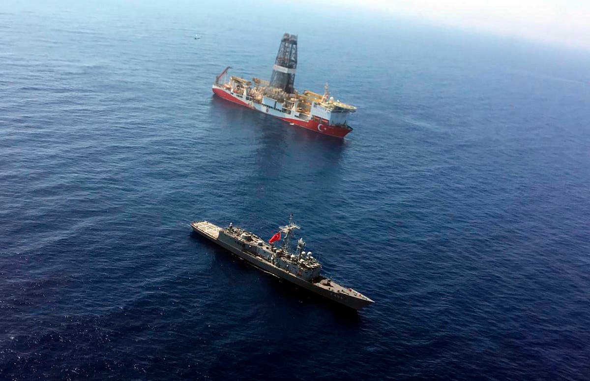 A Turkish Navy warship patrols on July 9, 2019, near Turkey’s drilling ship Fatih that is making its way towards the eastern Mediterranean near Cyprus. (AP)