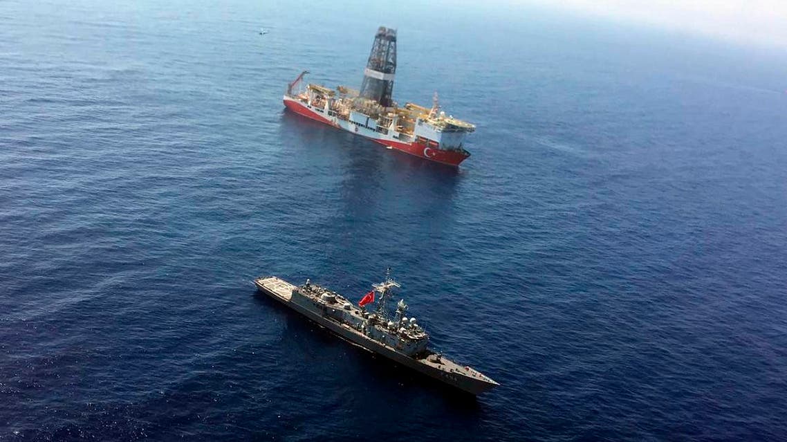 A Turkish Navy warship patrols on July 9, 2019, near Turkey’s drilling ship Fatih that is making its way towards the eastern Mediterranean near Cyprus. (AP)