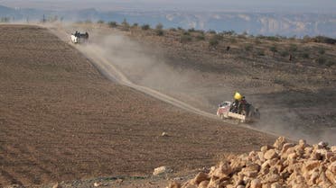 Fighters from the Democratic Forces of Syria head towards their positions during what they said was an offensive against Islamic State militants to take control of Tishrin dam, south of Kobani, Syria December 26, 2015. (Reuters)