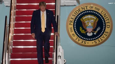 President Donald Trump departs Air Force One early on October 12, 2019, at the Andrews Air Force Base, Md., after returning from a campaign rally in Louisiana. (AP)