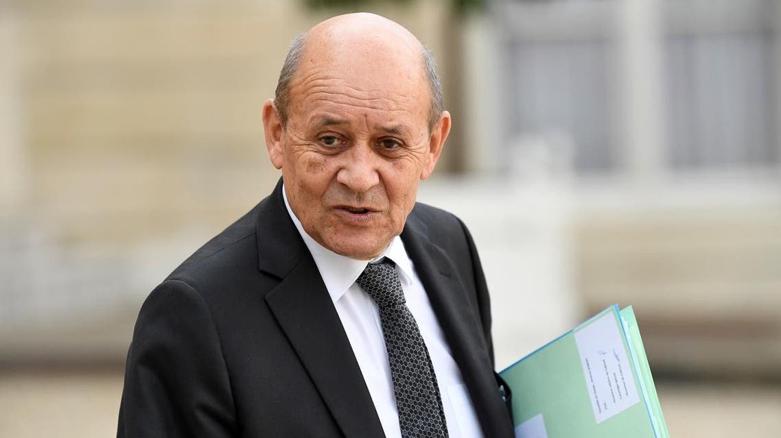 France's Foreign Minister Jean-Yves Le Drian gestures as he leaves The Elysee Presidential Palace in Paris on September 30, 2019. (AFP)