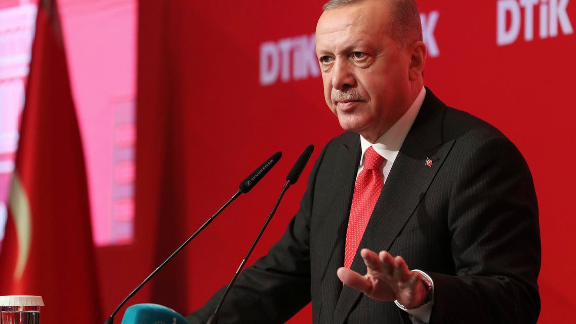 Turkey's President Recep Tayyip Erdogan addresses the World Turkish Business Council meeting, in Baku, Azerbaijan, Monday. Oct. 14, 2019. Erdogan says Turkey's military offensive into northeast Syria is as "vital" to Turkey as its 1974 military intervention in Cyprus, which split the island in two. (Presidential Press Service via AP, Pool)