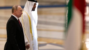 Russian President Vladimir Putin, left, and Abu Dhabi Crown Prince Mohamed bin Zayed al-Nahyan attend the official welcome ceremony in Abu Dhabi, United Arab Emirates, Tuesday, Oct. 15, 2019. (AP Photo/Alexander Zemlianichenko, Pool)