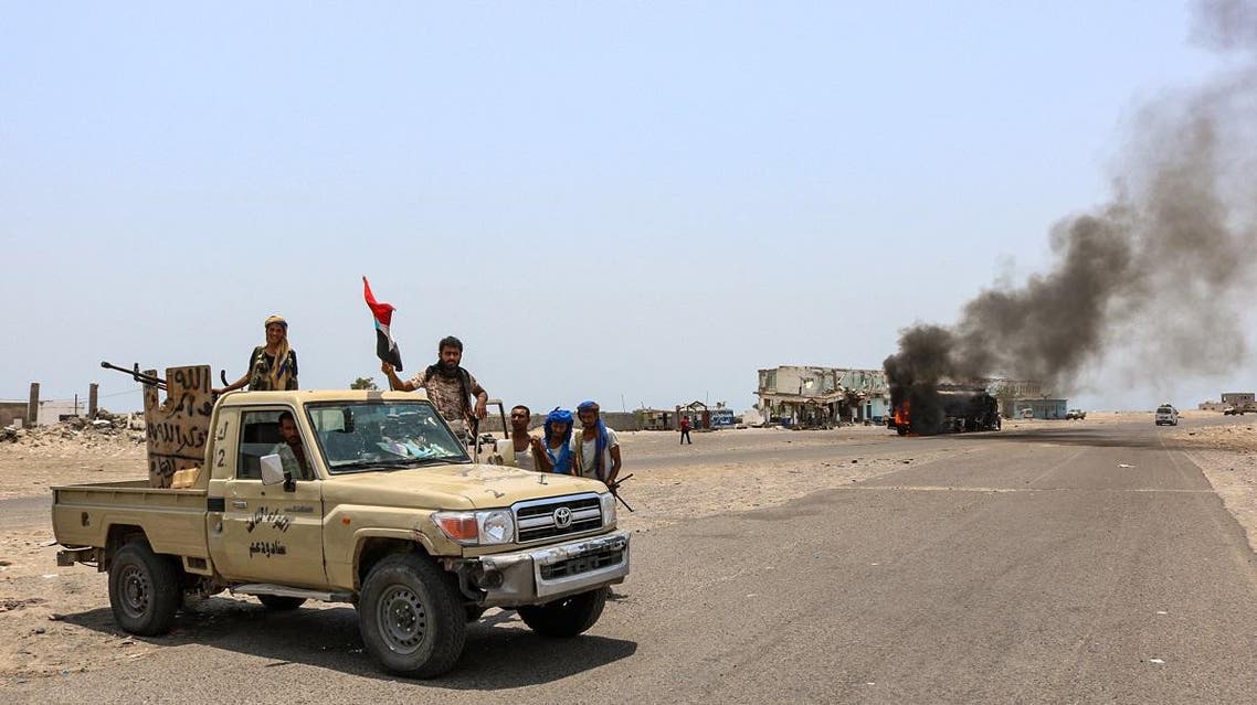 Fighters of the UAE-trained Security Belt Force, dominated by members of the Southern Transitional Council (STC) which seeks independence for south Yemen, gather at the Fayush-Alam crossroads on the eastern entrance Aden from the Abyan province in southern Yemen on August 30, 2019. (AFP)