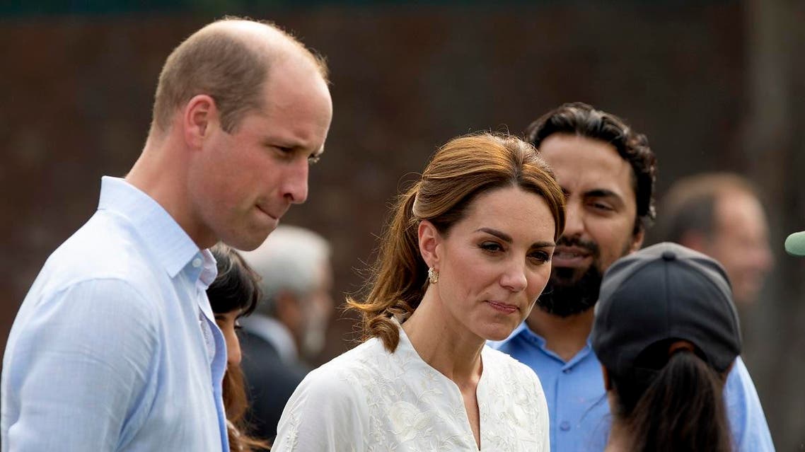 Britain’s Prince William and his wife Kate, Duchess of Cambridge meet Pakistani girls during their visit at the Pakistan Cricket Academy in Lahore, Pakistan, on Oct. 17, 2019. (AP).