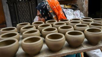 Earth and fire: India pottery village lights up for Diwali 