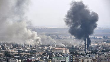 Picture shows smoke rising from the Syrian town of Ras al-Ain. (File photo: AFP)