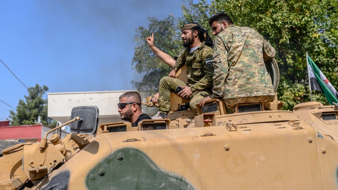 - فرانس برس)عناصر من فصائل مسلحة مدعومة من أنقرة في تل أبيض شمال سوريا(18 أكتوبر 