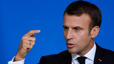 France’s President Emmanuel Macron gestures at a press conference during a European Union Summit at European Union Headquarters in Brussels on October 18, 2019. (AFP)