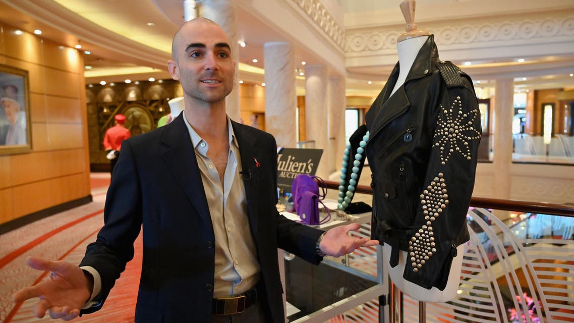 Quinn Tivey, grandson of late US-British actress Elizabeth Taylor, speaks during a Julien's Auctions press preview of items owned by the actress aboard the Cunard ocean liner Queen Mary 2 on October 18, 2019, in Brooklyn, New York. (AFP)