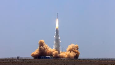 A rocket carrying two satellites lifts off from the Jiuquan Satellite Launch Centre in northwest China's Gansu province on July 25, 2019. (AFP)