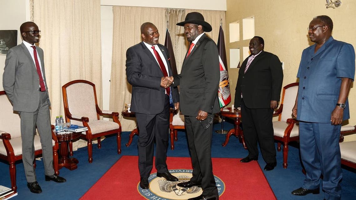 South sudan's ex-vice president and former rebel leader Riek Machar (2nd L) meets with South Sudan's President Salva Kiir (3rd R) at the presidential office in Juba, on October 19, 2019. (AFP)