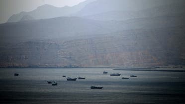 fishing boats and cargo ships are seen in the Strait of Hormuz at Khasab area of Oman on January 2012 AFP