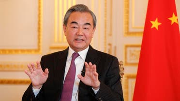 Chinese Foreign Minister Wang Yi gestures during an interview with AFP in Paris on October 21, 2019. (AFP)