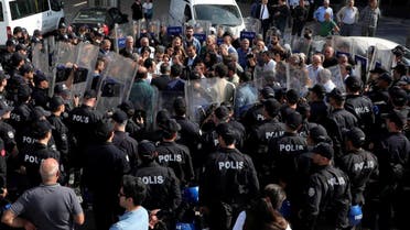 Pro-Kurdish Peoples' Democratic Party (HDP) lawmakers are surrounded by riot police as they protest against detention of their local politicians in Diyarbakir, Turkey, October 21, 2019. REUTERS/