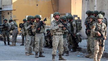 Turkish soldiers secure in Syrian town of Ras al Ayn, northeastern Syria, Wednesday, Oct. 23, 2019. (AP)
