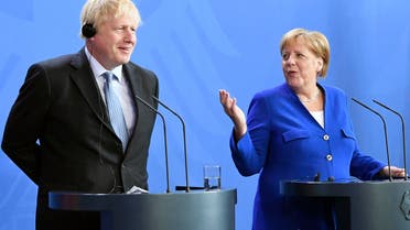 Germany's Chancellor Angela Merkel and British Prime Minister Boris Johnson attend a joint press conference, in Berlin, Wednesday, Aug. 21, 2019.  (AP)