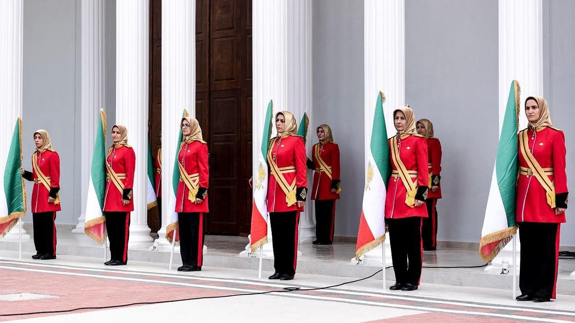 Mujahedin-e Khalq honor guard stand guard during a welcoming ceremony for personalities taking part in the conference "120 Years of Struggle for Freedom Iran" at the Ashraf-3 camp, which is a base for the People's Mojahedin Organization of Iran (MEK) in Manza, Albania, on July 12, 2019. (AFP)