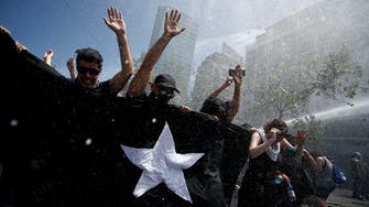 Protests rage in Chile despite president’s reform promise