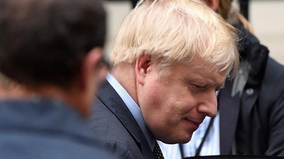 British Prime Minister Boris Johnson is seen outside Downing Street in London. (Reuters)