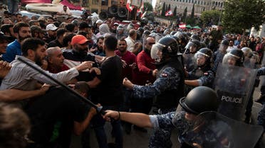2019-10-25T133224Z_944537826_RC1A345AA840_RTRMADP_3_LEBANON-PROTESTS-SCUFFLES