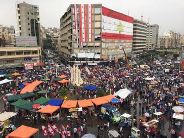 Demonstrators protesters in Tripoli, Lebanon, Thursday October 24 - Reuters