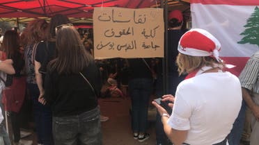 Lebanon citizens attend a civil society tent - AA