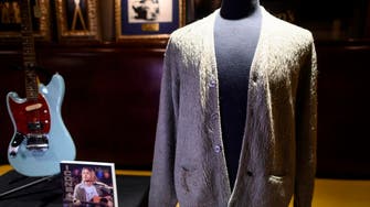 Kurt Cobain’s cigarette-burned sweater sells for $334,000