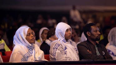 Ethiopians listen to Dereje Negash from the Orthodox Church's Mahibere Weyniye Abune Teklehaimanot group as he speaks in Addis Ababa, Ethiopia Sunday, Sept. 8, 2019. (AP)
