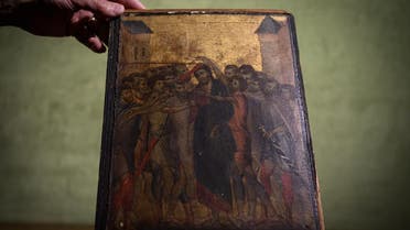 a painting entitled "the Mocking of Christ" by the late 13th century Florentine artist Cenni di Pepo also known as Cimabue. (AFP)
