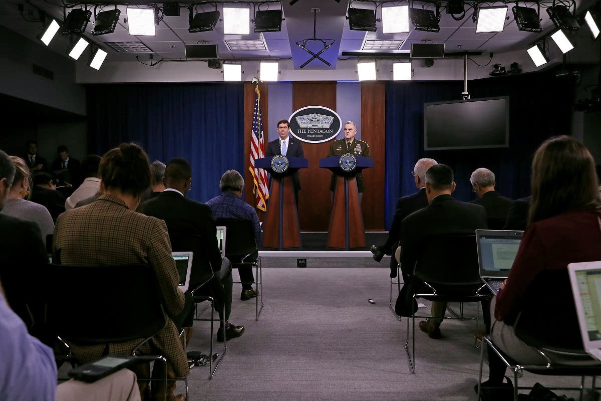 US Defense Secretary Mark Esper (L) and Chairman of the Joint Chiefs of Staff Gen. Mark Milley hold a news conference at the Pentagon the day after it was announced that Abu Bakr al-Baghdadi was killed in a US raid in Syria October 28, 2019 in Arlington, Virginia. (AFP)