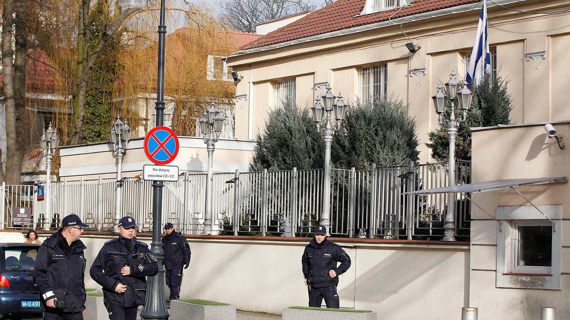 Police patrolling a street near the Israeli Embassy in Warsaw, Poland, Wednesday, Jan. 31, 2018, after a local governor, citing security concerns, banned traffic in the area in order to prevent a planned protest by far-right groups. (AP)