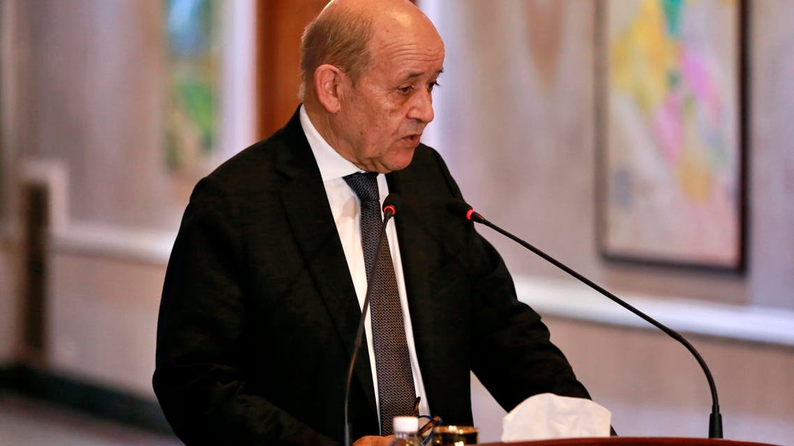 French Foreign Minister Jean-Yves Le Drian holds a press conference with Iraqi counterpart Mohamed Alhakim at the Ministry of Foreign Affairs in Baghdad, Iraq, Thursday, Oct. 17, 2019. (AP