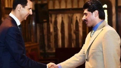 محمد القطرنجي مع بشار الأسد