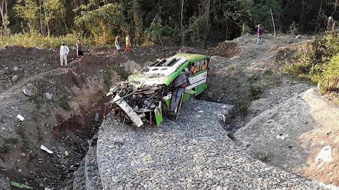 The wreckage of a passenger bus Wednesday, March 21, 2018, after it careened off a road and fell into a ravin at Sablayan township, Mindoro Occidental province in central Philippines, south of Manila. (AP)