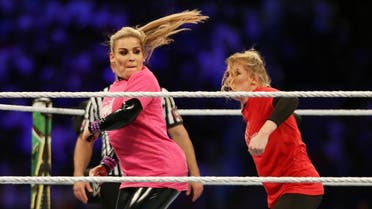 Natalya in action with Lacey Evans during the first-ever women's fight match to be held in Saudi Arabia. (Reuters)