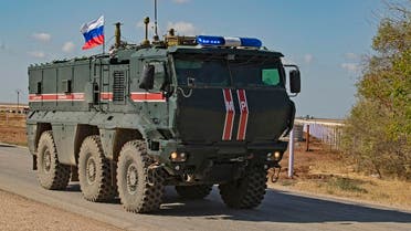 A Russian army vehicle takes part in a patrol of members of the Syrian Kurdish Asayish internal security forces and Russian military police in the town of Darbasiyah in Syria's northeastern Hasakeh province along the Syria-Turkey border on October 30, 2019. (AFP)