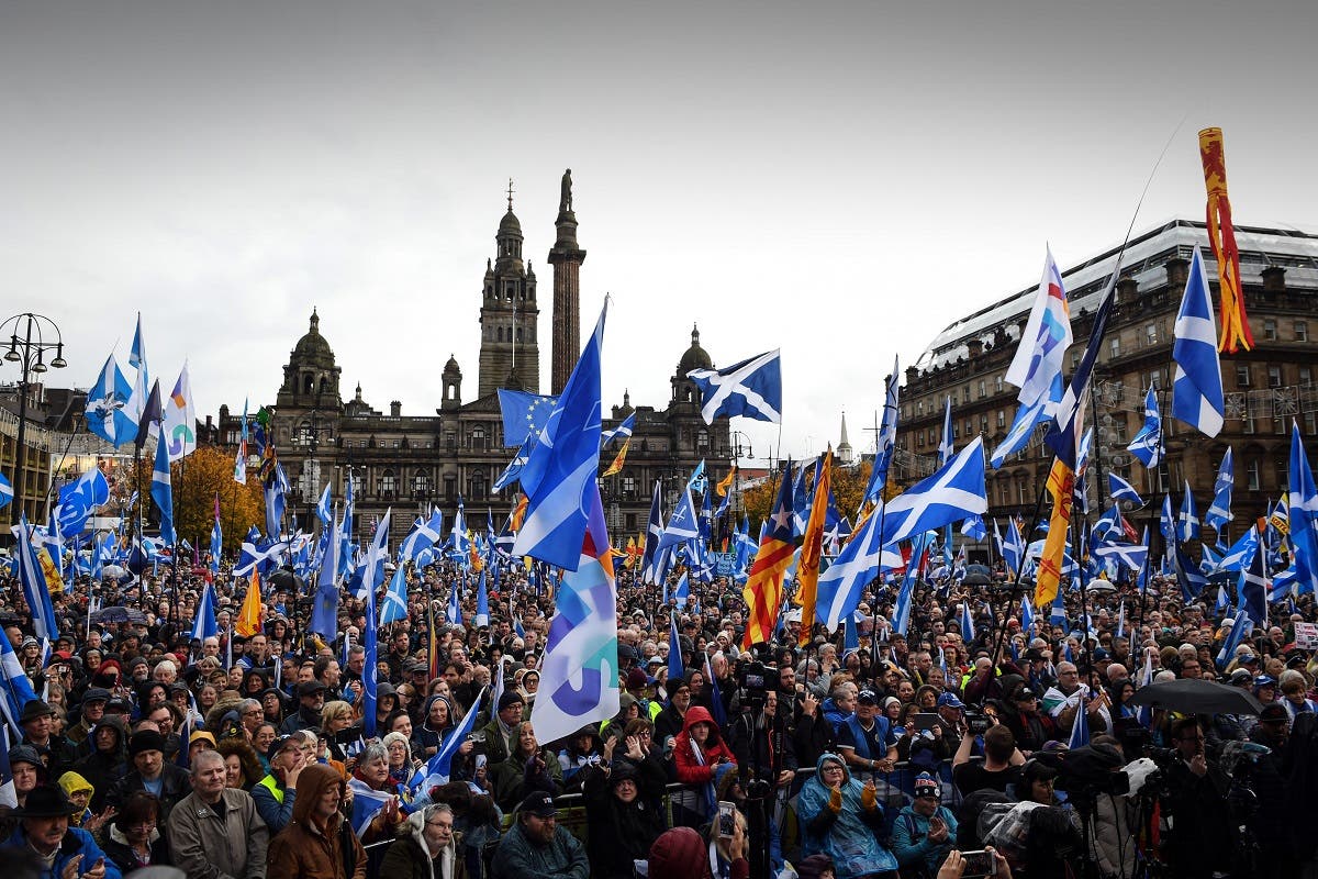 Pro Scottish Independence campaigners listen as Scottish Nationalist Party (SNP) leader Nicola Sturgeon, Scotland’s First Minister addresses a rally calling for Scottish independence in Glasgow on November 2, 2019. (AFP)