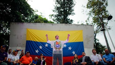 Opposition leader and self-proclaimed interim President Juan Guaido speaks during a citizen assembly at a square in the neighborhood of El Paradiso in Caracas, Venezuela, Monday, Sept. 30, 2019. (AP)