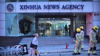 Hong Kong anti-government protesters attack office of Chinese news agency