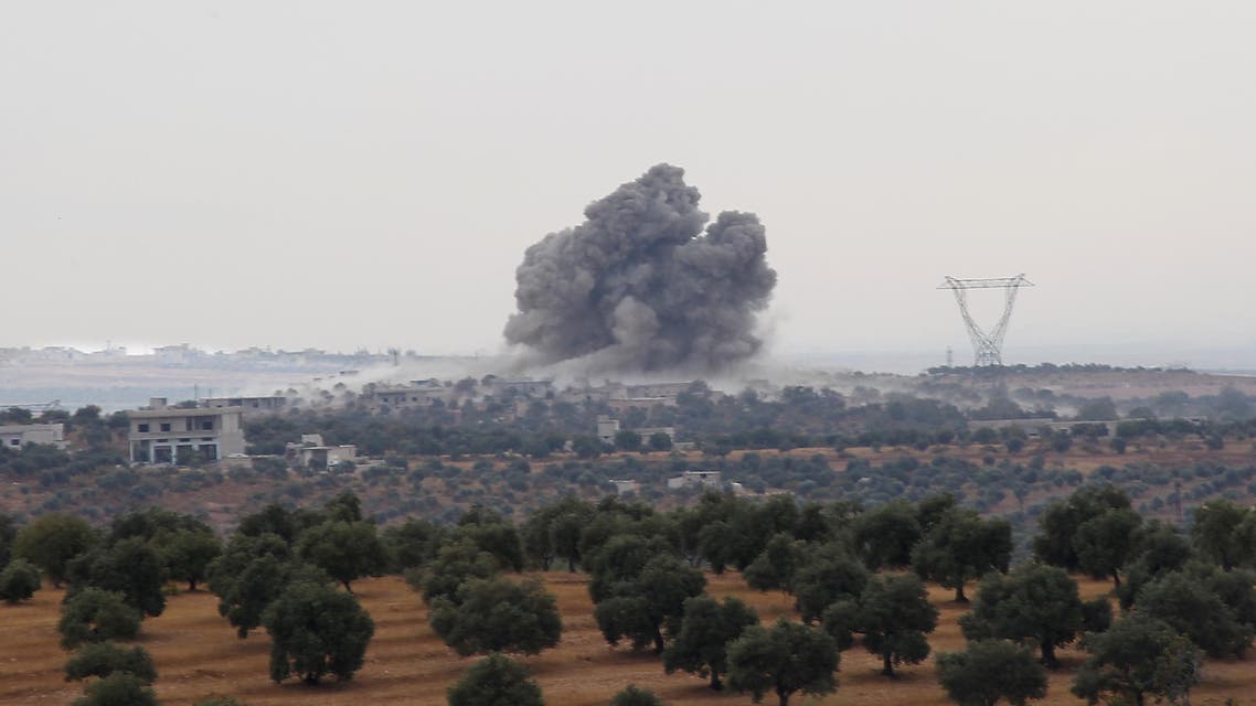 Smoke billows following a reported Russian air strike in the south of the northwestern Syrian province of Idlib near the village of Rakaya, on October 24, 2019 (AP)