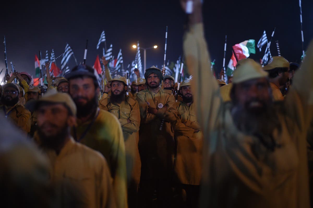 Activists of Islamic political party Jamiat Ulema-e-Islam (JUI) gather during an anti-government “Azadi (Freedom) March” in Islamabad on November 3, 2019. (AFP)