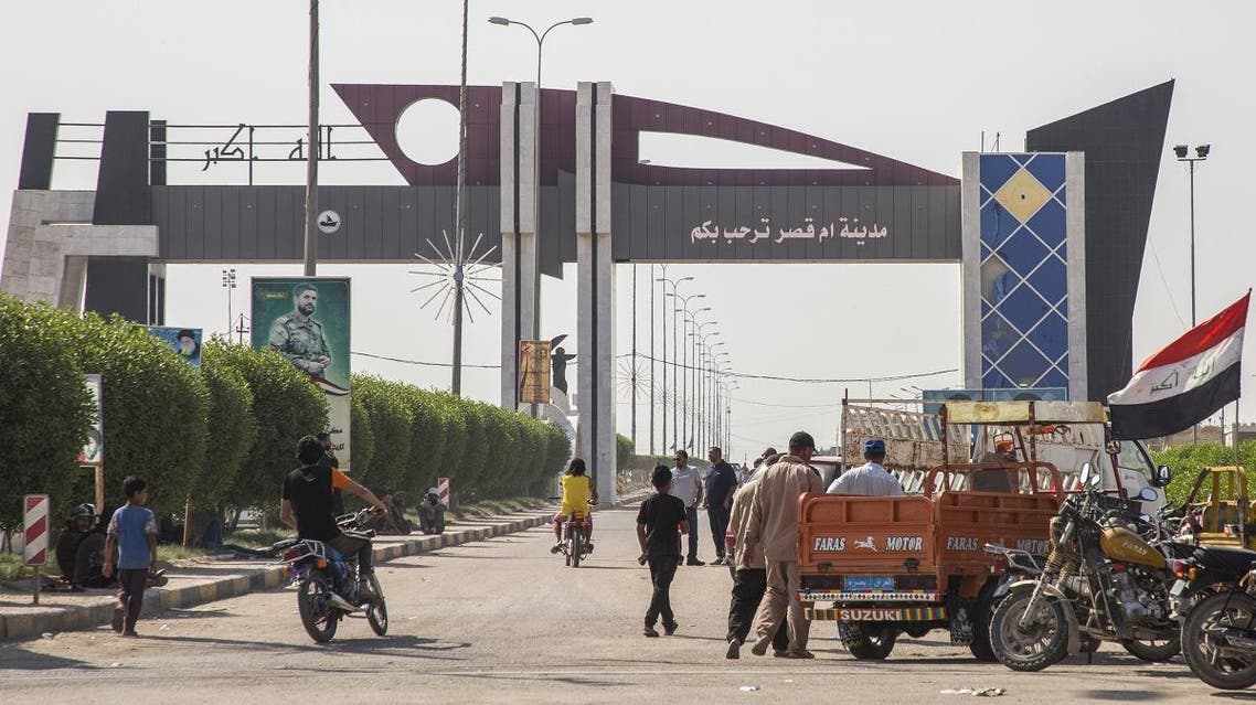 Iraqi protesters block the highway leading to Umm Qasr port during ongoing anti-government demonstrations in southern Iraq on November 3, 2019. (AFP)