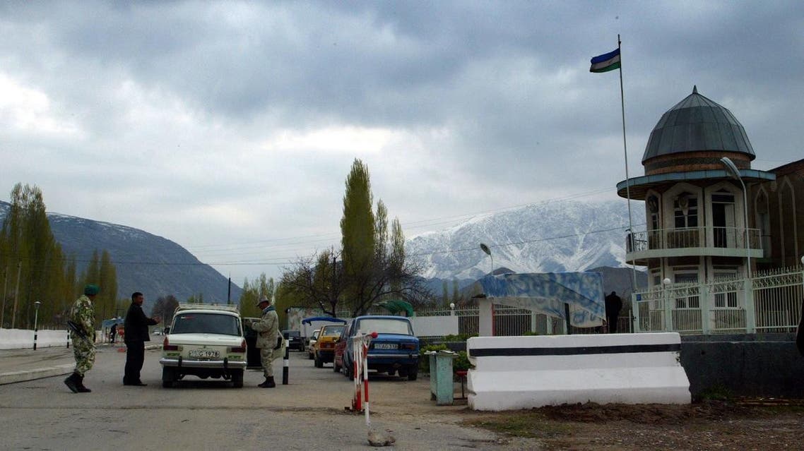 Uzbek soldiers search a car at a checkpoint on the border with Kyrgyzstan, in the Fergana Valley Uzbekistan , a region that embraces three countries, Tajikistan, Uzbekistan and Kyrgyzstan. (AP)