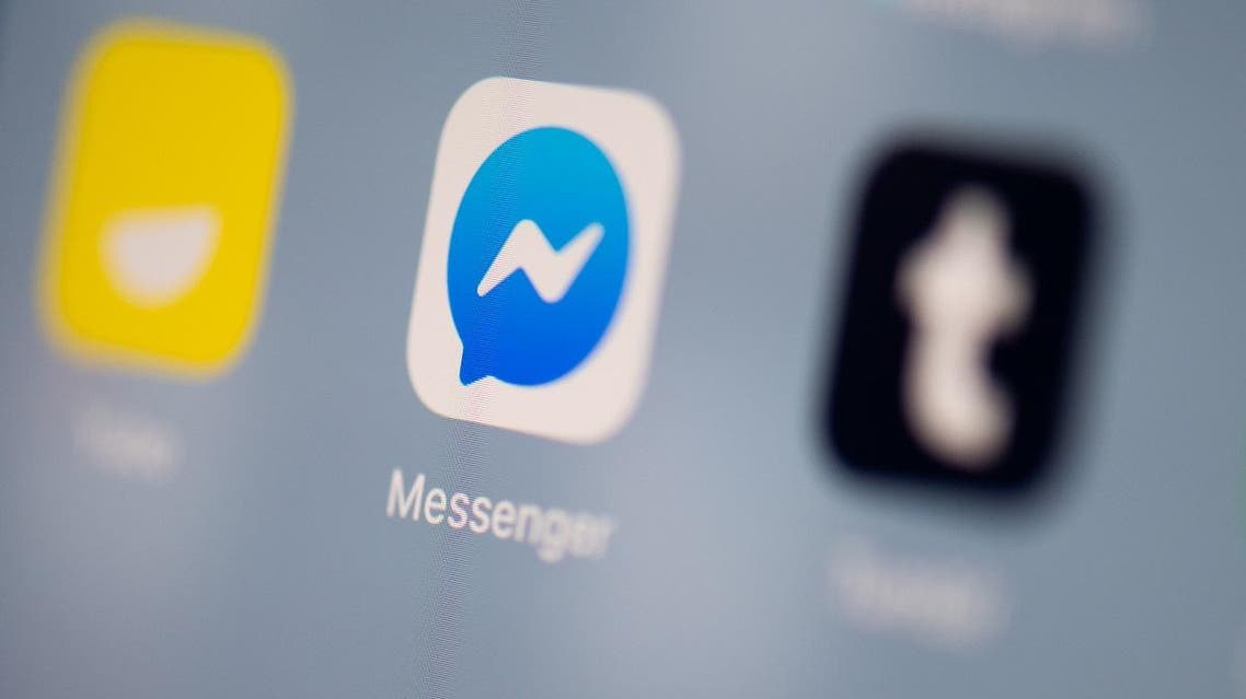 This illustration picture taken on July 24, 2019 in Paris shows the logo of the instant messaging application of Facebook called Messenger on the screen of a tablet. (AFP)